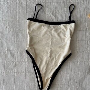 Elegant Cream and Black One-Piece Swimsuit